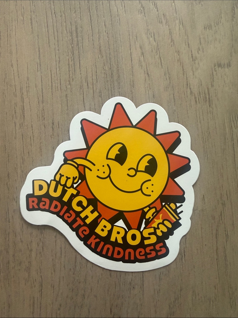 Dutch Bros Sunny Smiling Logo Sticker - Yellow & Orange